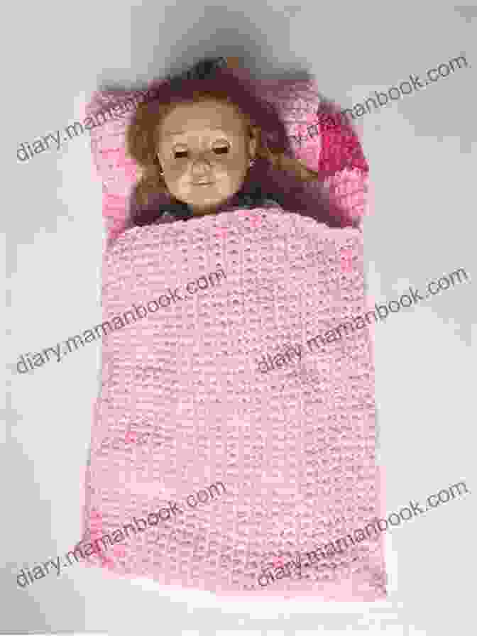 A Close Up Of The Knitted Doll Sleeping Bag, Showing The Garter Stitch Pattern And The Drawstring Closure. Knitting Pattern KP404 Doll Sleeping Bag 10 12 14 16 USA Terminology