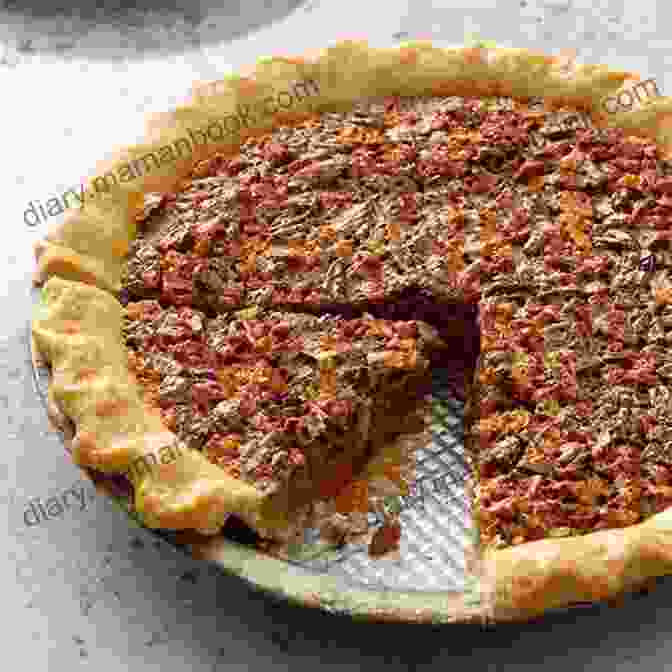 A Pecan Pie, Its Dense Filling Studded With Crunchy Pecan Halves, Embodying The Sweet Traditions Of The South. Learn The Art Making Pie For All Occasions: Delicious Sweet And Savory Pies From Dew And Onion To Pecan Pie